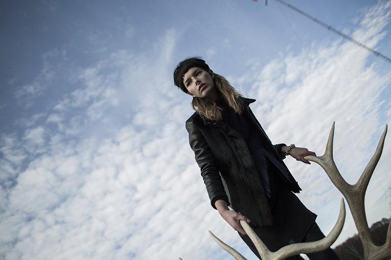 Jacket: Nour Hammour, Sweater: One Grey Day, Dress: Carleen, Shorts: Roomeur, Tights: Hue, Bracelets: Pushmahaata, Earrings: Erica Weiner, Boots: Dr. Marten