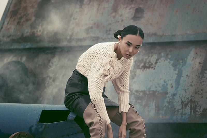 Knitwear: Danny Reinke Skirt: Anthony Vaccarello Boots: Vivienne Westwood Vintage Jewellery: Stylists Own