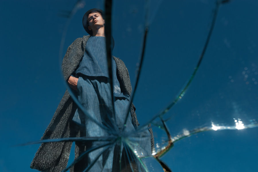 Hat - Stylist's own Black and gray coat - Vadim Merlis (podium collection fall winter 2016-2017) Blue sweatshirt - Vadim Merlis (podium collection fall winter 2016-2017)