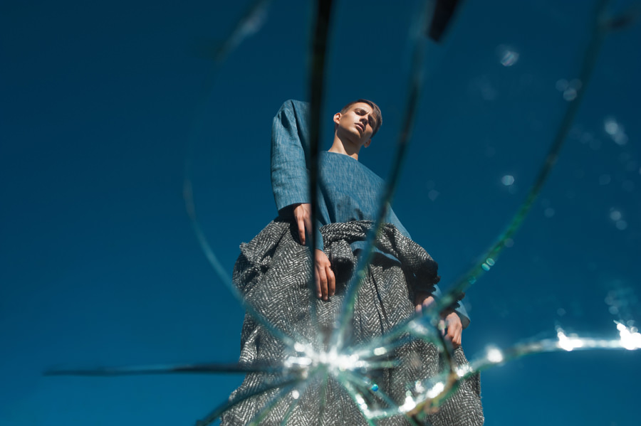 Blue sweatshirt - Vadim Merlis (podium collection fall winter 2016-2017) Black and gray coat - Vadim Merlis (podium collection fall winter 2016-2017) Black and gray pants - Vadim Merlis (podium collection fall winter 2016)