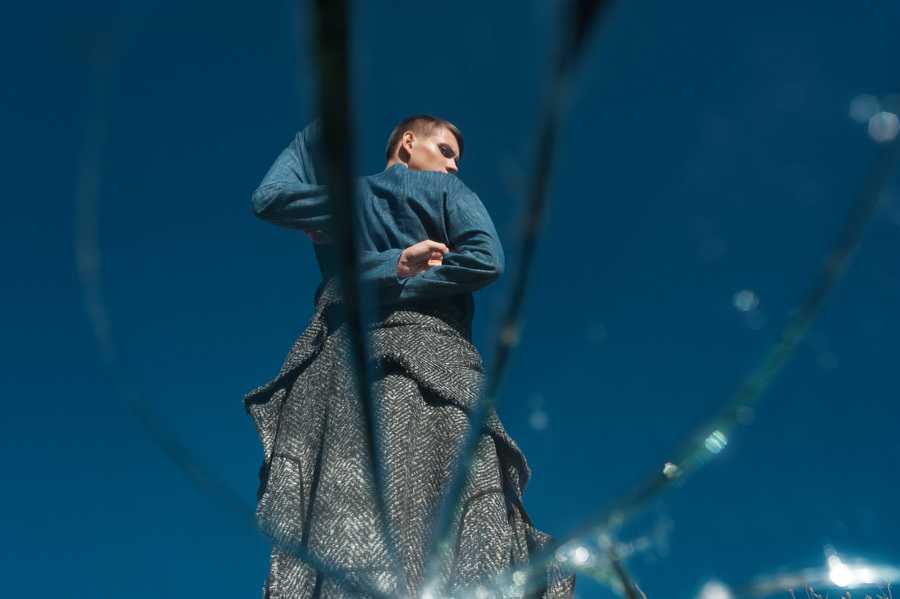 Blue sweatshirt - Vadim Merlis (podium collection fall winter 2016-2017) Black and gray coat - Vadim Merlis (podium collection fall winter 2016-2017) Black and gray pants - Vadim Merlis (podium collection fall winter 2016)