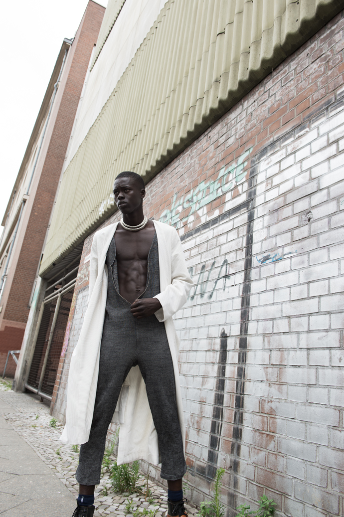 Jumpsuit: FOMME, coat: Hermione FLYNN, belt worn as necklace: BLACK & BROWN, socks: STANCE, shoes: VELT