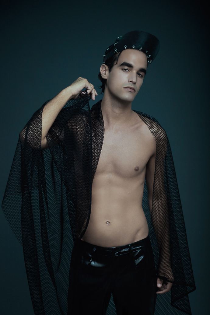 X-Ray cap by Romain Thevenin Vynil trousers by Versace