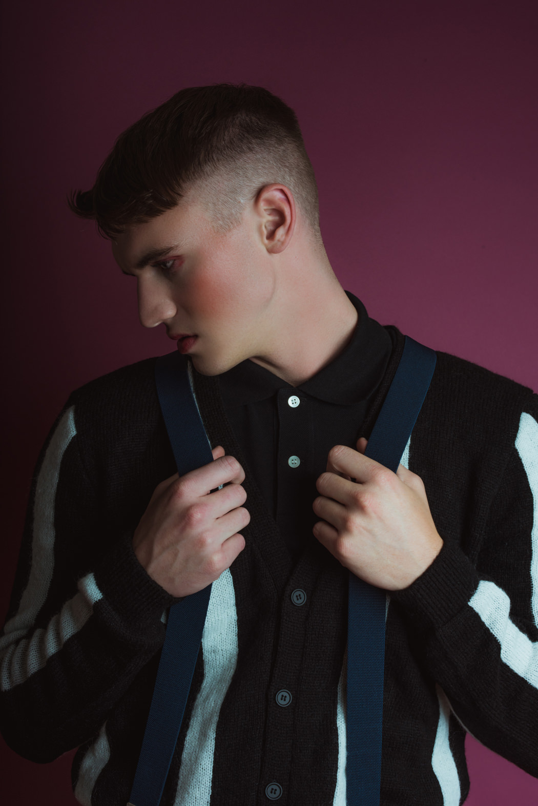 Pants by Raf Simons Polo by Comme Des Garcon Play Cardigan by Top Man Wrist Cuff by The Sum Boots by Wood-Wood Suspenders Models Own