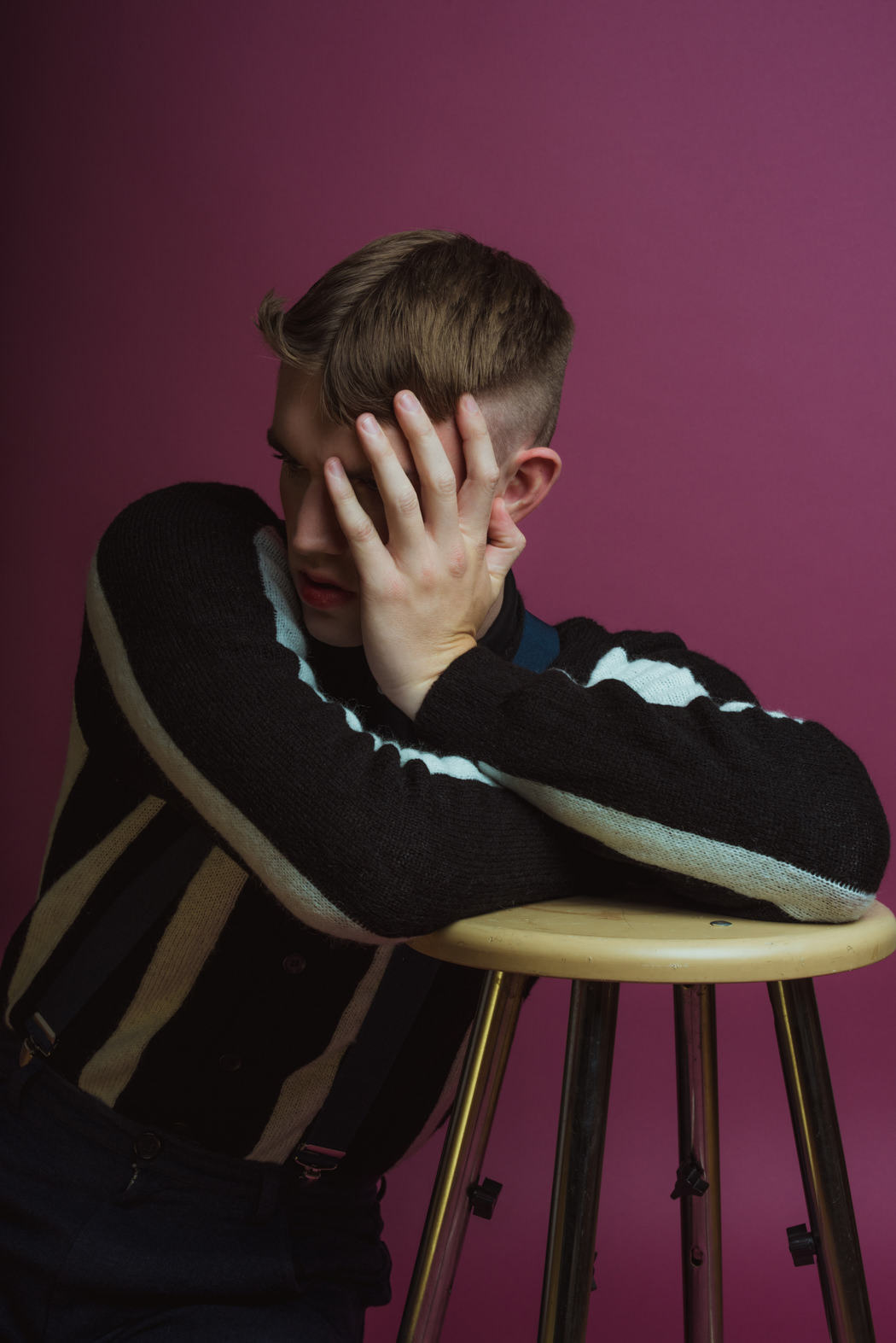 Pants by Raf Simons Polo by Comme Des Garcon Play Cardigan by Top Man Wrist Cuff by The Sum Boots by Wood-Wood Suspenders Models Own