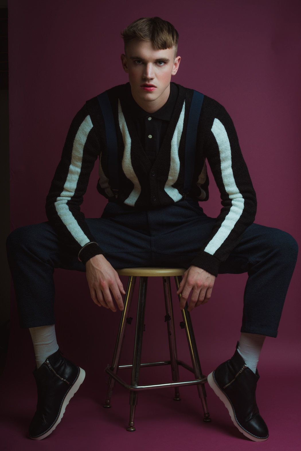 Pants by Raf Simons Polo by Comme Des Garcon Play Cardigan by Top Man Wrist Cuff by The Sum Boots by Wood-Wood Suspenders Models Own